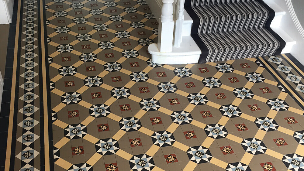 Contemporary floor tile pattern combining squares and diamonds in grey tones.