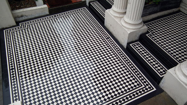 Black and White chequerboard tiling to large set of entrance steps. Gallery 14 - Black and White tiles installed in Maida Vale, London