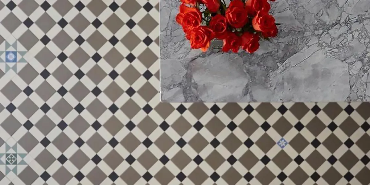 Traditional black, white and grey tile pattern, and marble counter-top with red flowers