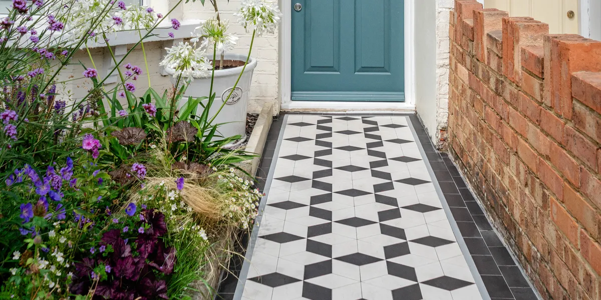 Black and white equilateral shaped path tiles.