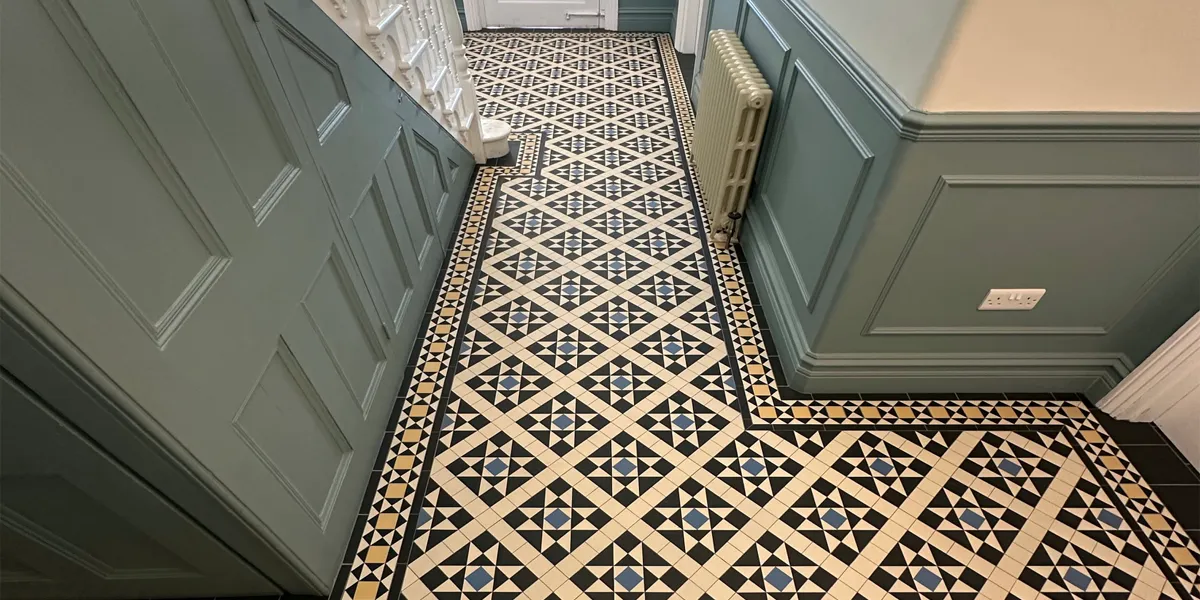 Victorian mosaic hallway tiling, with wainscoat panelling.