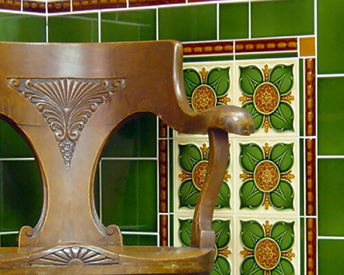 Victorian green hall wall tiles.