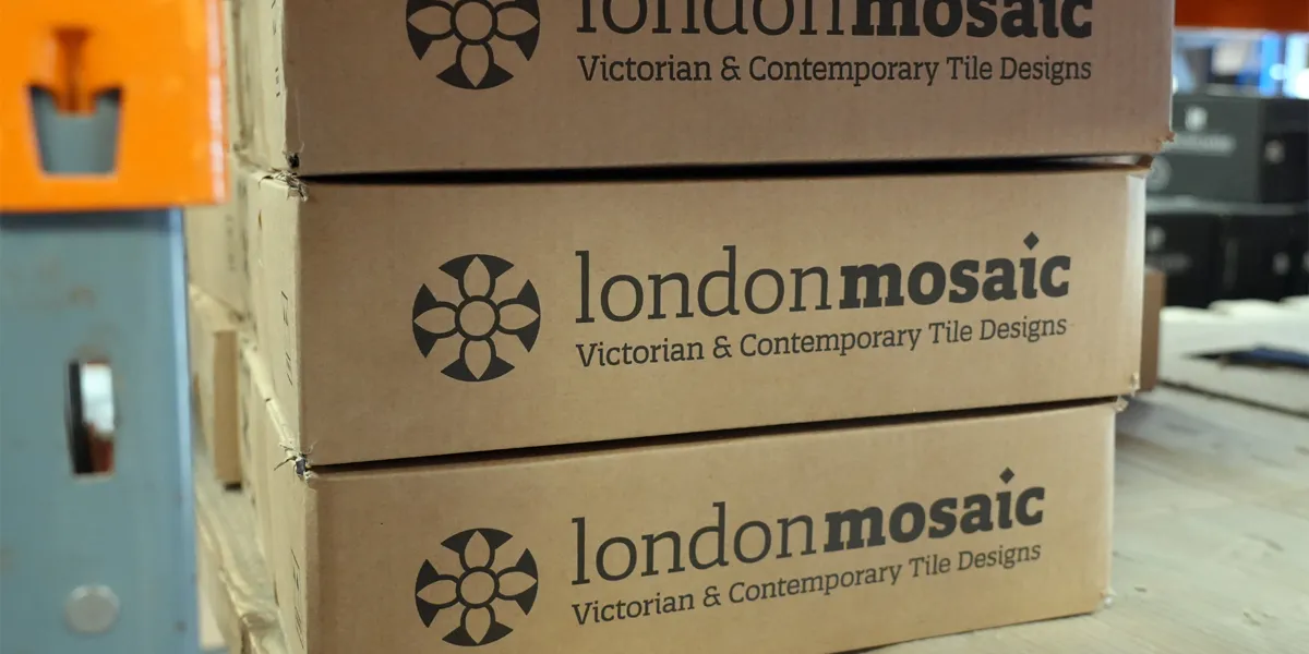 Stacked boxes of London Mosaic tiles