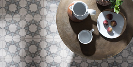 Cement effect porcelain tiles printed with decorative patterns
