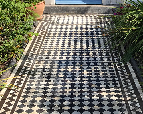 Black and White path tiles restored and repaired.